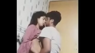 Boy seducing Girl in Room