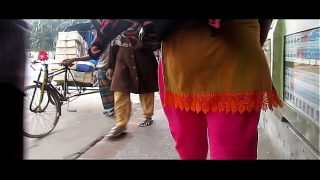 Garments Girl walking in the street with a sexy booty Video